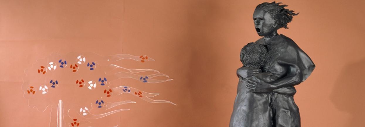 Lin Onus Maralinga 1990 (detail). Fibreglass, synthetic polymer paint, acrylic and paper stickers, (a) 163 x 56 x 62 cm (figure) (b) 125 x 119 x 45 cm (cloud). State Art Collection, Art Gallery of Western Australia. Purchased 1990.